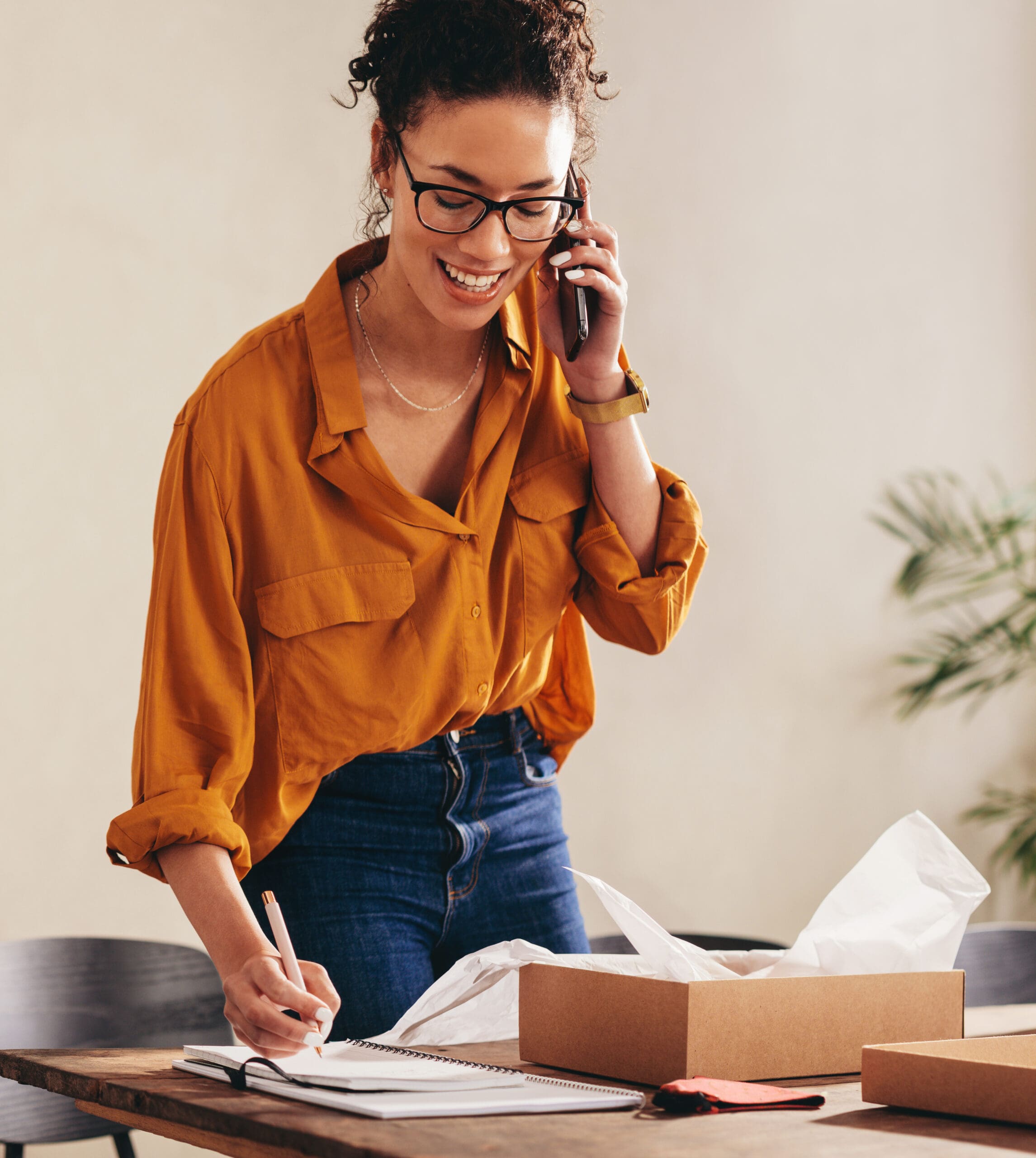 A small business owner making a phone call.