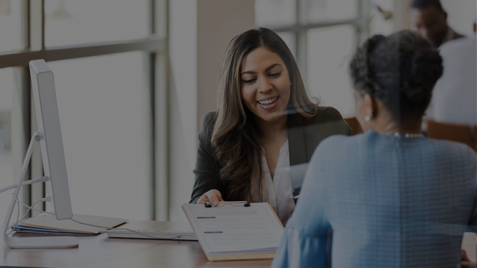 insurance angecy worker and client