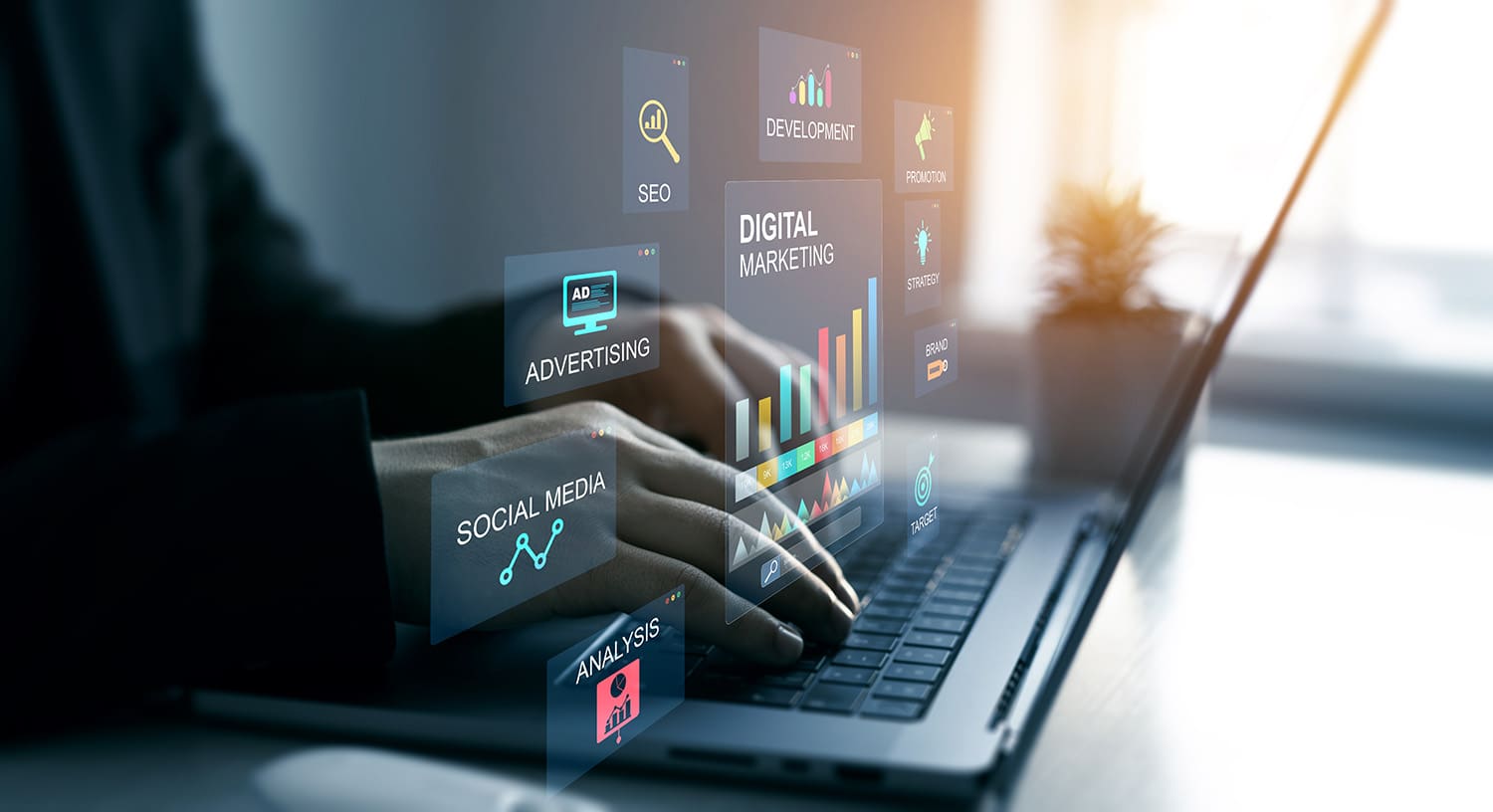 A person using a computer with a digital representation of emerging digital marketing trends.